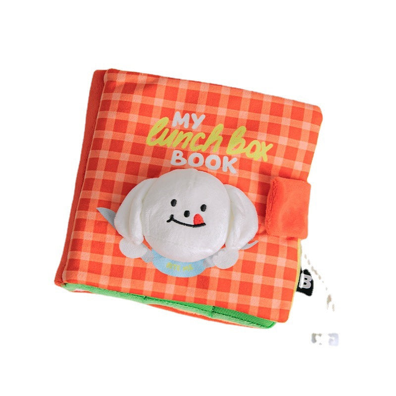 Pet Book Puzzle Toy in orange showing book shape and soft cloth plaid pattern - white dog on cover - white background
